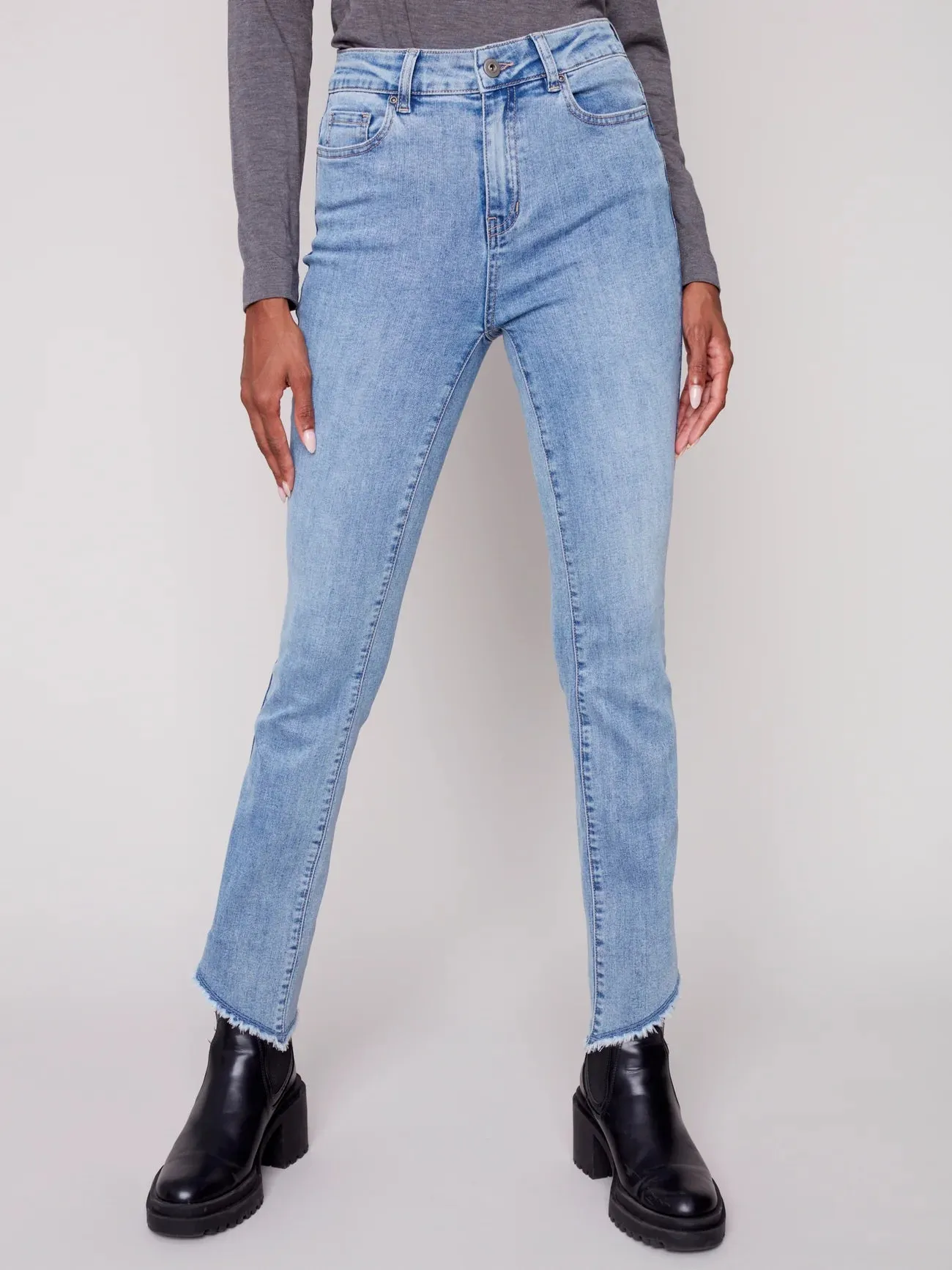 ASYMMETRICAL FRINGED HEM JEAN