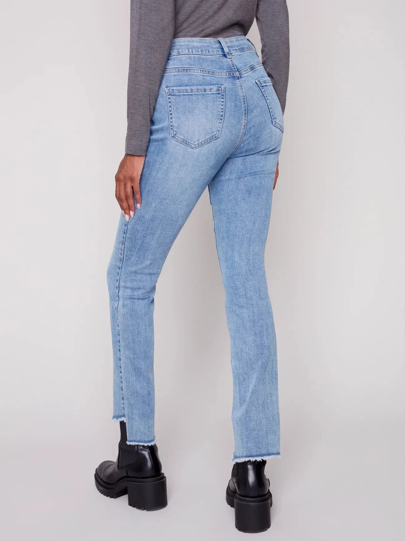 ASYMMETRICAL FRINGED HEM JEAN